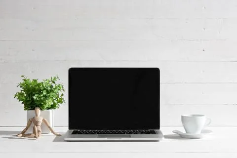 The front view of notebook and cup of coffee. Inspiration and mock-up concept Stock Photos