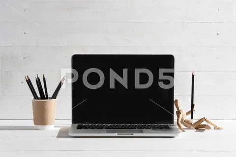 The front view of notebook and cup of coffee. Inspiration and mock-up concept Stock Photos