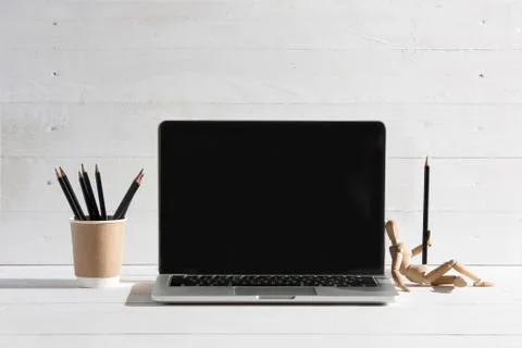 The front view of notebook and cup of coffee. Inspiration and mock-up concept Stock Photos