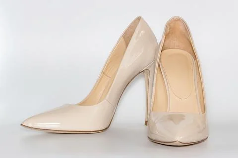 Front view of the nude colored high heeled women's shoes. Stock Photos