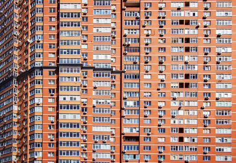 Front view of office building windows. Background Fotos Stock