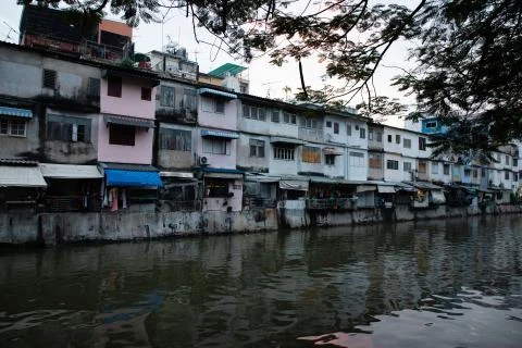 Front view of old buildings over a river in Bangkok Stock Photos