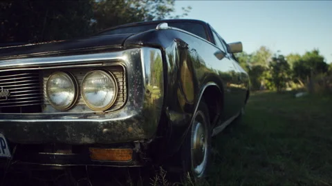 Front view of an Old car parked on a farm Stock Footage 278798215