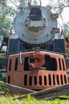Front view of an old rusty steam locomotive at Liberation Park the Dean Stock Photos