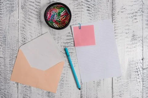 Front view open colored rectangular envelope blank sheet paper sticky note 写真素材