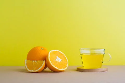 A front view of orange decorated with tea 스톡 사진