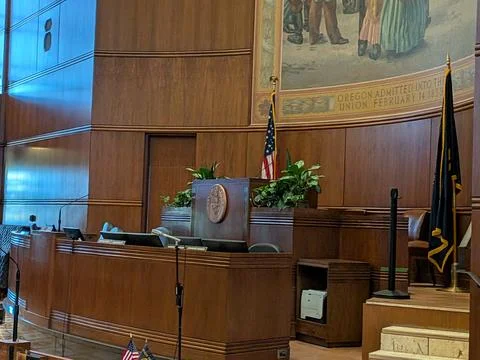 Front view of the Oregon State Senate featuring wooden desks, Stock Photos