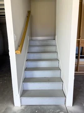 Front View of Painted Basement Stairs Stock Photos