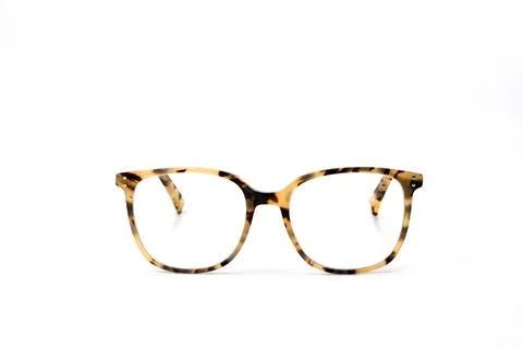 Front view of a pair of women's reading glasses with a pattern frame 库存照片