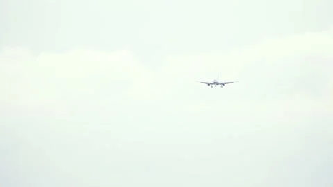 Front view of passenger airplane approaching the airport Stock Footage 237988312