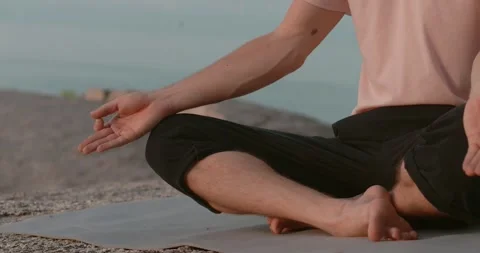 Front view person fingers mudra gesture beach embodying calm. Mudra gesture of Stock Footage 271008453