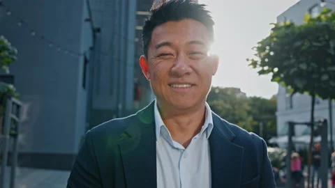 Front view portrait smiling happy Asian middle-aged businessman Korean adult Stock Footage 211812837