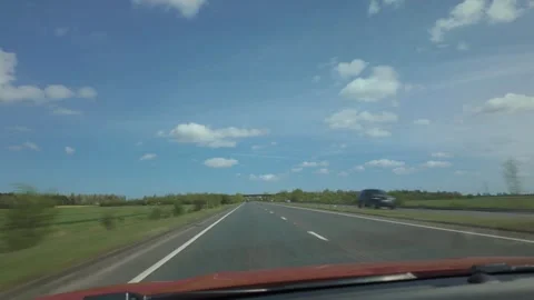 Front view PoV driving british A Roads on a bright spring morning Vídeos de archivo 332574382
