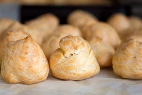 Front view of profiteroles. Appetizing homemade food for breakfast. Stock-Fotos