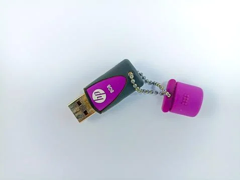 Front view of a purple usb flash drive from a hp brand on a white background Stock Photos