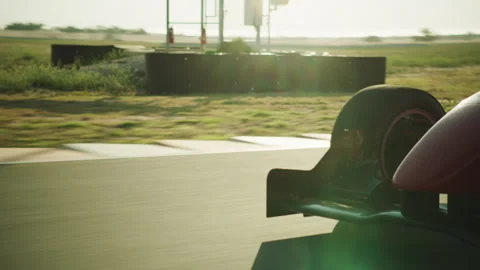 Front view of Race Car going fast on the track Stock Footage 264424208