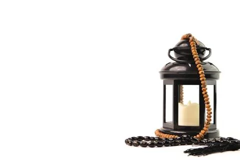 Front view of Ramadan lantern and prayer beads isolated on a white background Stock Photos