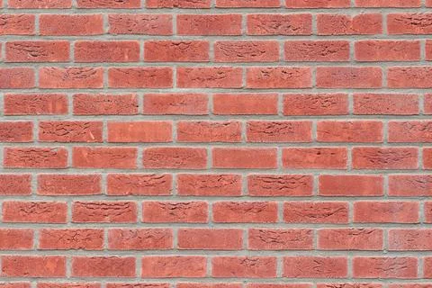 Front view on red brick wall Stock Photos