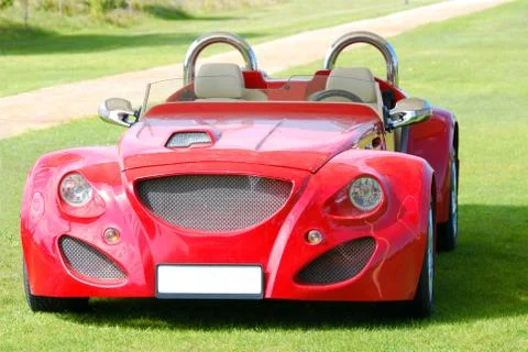 Front view of red fast cabriolet car.JPG 스톡 사진