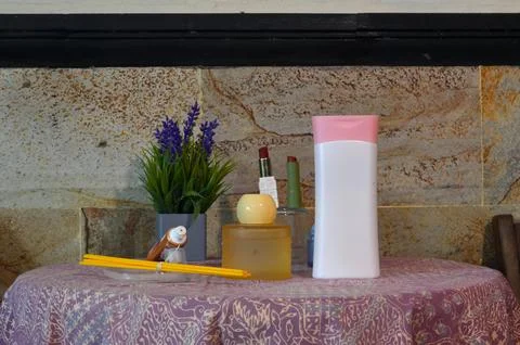 Front View of Reed Diffuser and Beauty Products on Table Stock Photos