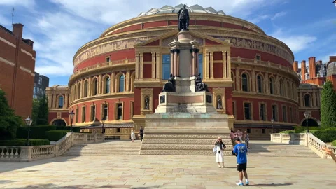Front view of the Royal Albert Hall, with people gathered at the entrance Stock Footage 322519037