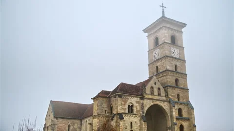 Front view of the Saint Michael Cathedral in Alba Iulia, Romania on a foggy Stock Footage 297210089