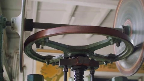 Front view of screw of old screw machine in metal workshop from top to bottom Stock Footage 95892965