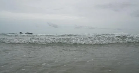 Front view of sea wave before raining and storm on tropical beach. Stock Footage 277946793