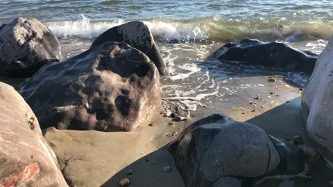 Front view of sea waves breaking on rocks. Stock Footage 141611694