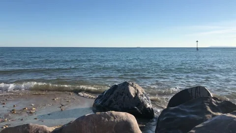 Front view of sea waves breaking on rocks. Stock Footage 141612961