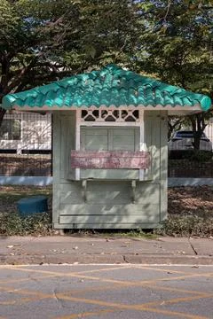 Front view of Security guard olive green booth (Guardhouse) in public park. Stock Photos