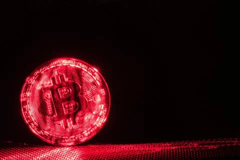 Front view of single golden bit coin Stock Photos