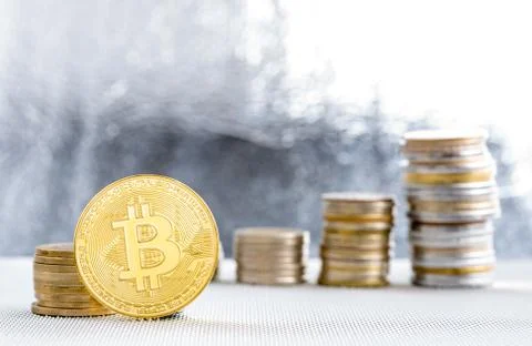 Front view of single golden bit coin Stock Photos