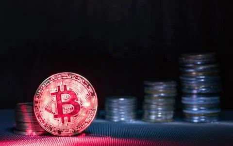 Front view of single golden bit coin Stock Photos