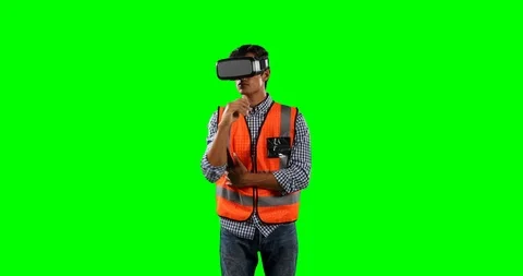 Front view of a site worker using virtual reality with green screen Stock Footage 127057800