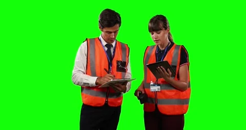 Front view of a site workers using digital tablet with green screen Stock Footage 339412441