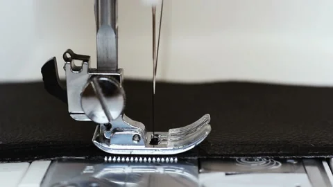 Front view slow motion of needle with thread of sewing machine sew leather Vídeo Stock 108170080