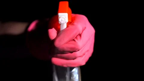 Front view slow motion spray bottle spraying cleaning product Stock-Footage 127005524