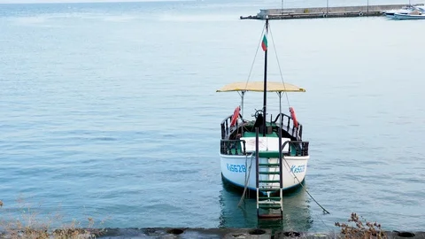 Front view of small boat in the harbour Stock Footage 94321716