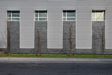 Front view of a small modern office building Stock Photos