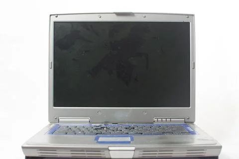 Front view of a smashed latop with a cracked screen Stock Photos