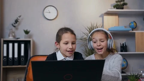 Front view of smiling happy two teenage girls which having fun together while Stock Footage 124701878