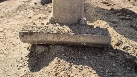 Front view of soil compaction at construction site with handheld rammer Stock-Footage 335999690
