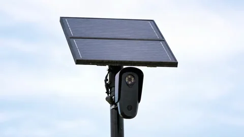 Front View of Solar Powered Roadside Camera Against Cloudy Sky Video stock 346406683