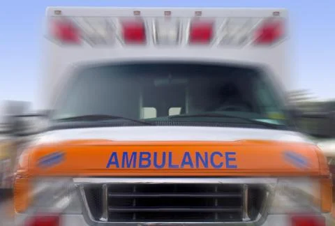 Front view of a speeding ambulance - emergency vehicle Foto stock