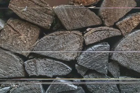 Front view of stacked fire logs, background Stock Photos