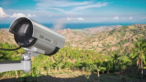 Front view of surveillance camera or cctv against nature background Video stock 82956835