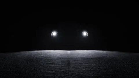 Front view tracking a car driving on an asphalt road at night at speed. 4K Stock-Footage 234303027