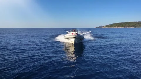 Front view tracking of a sports RIB boat Stock Footage 301092553