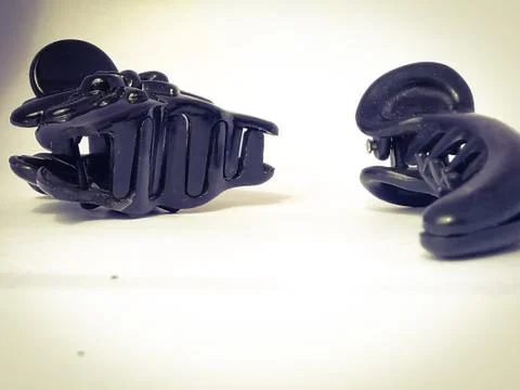 Front view of the two claw type party hair clips are placed isolated in a whi Stock Photos